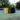 Stainless Steel 26 oz Shaker Bottle among various shaker bottles in different colors on a tennis court.