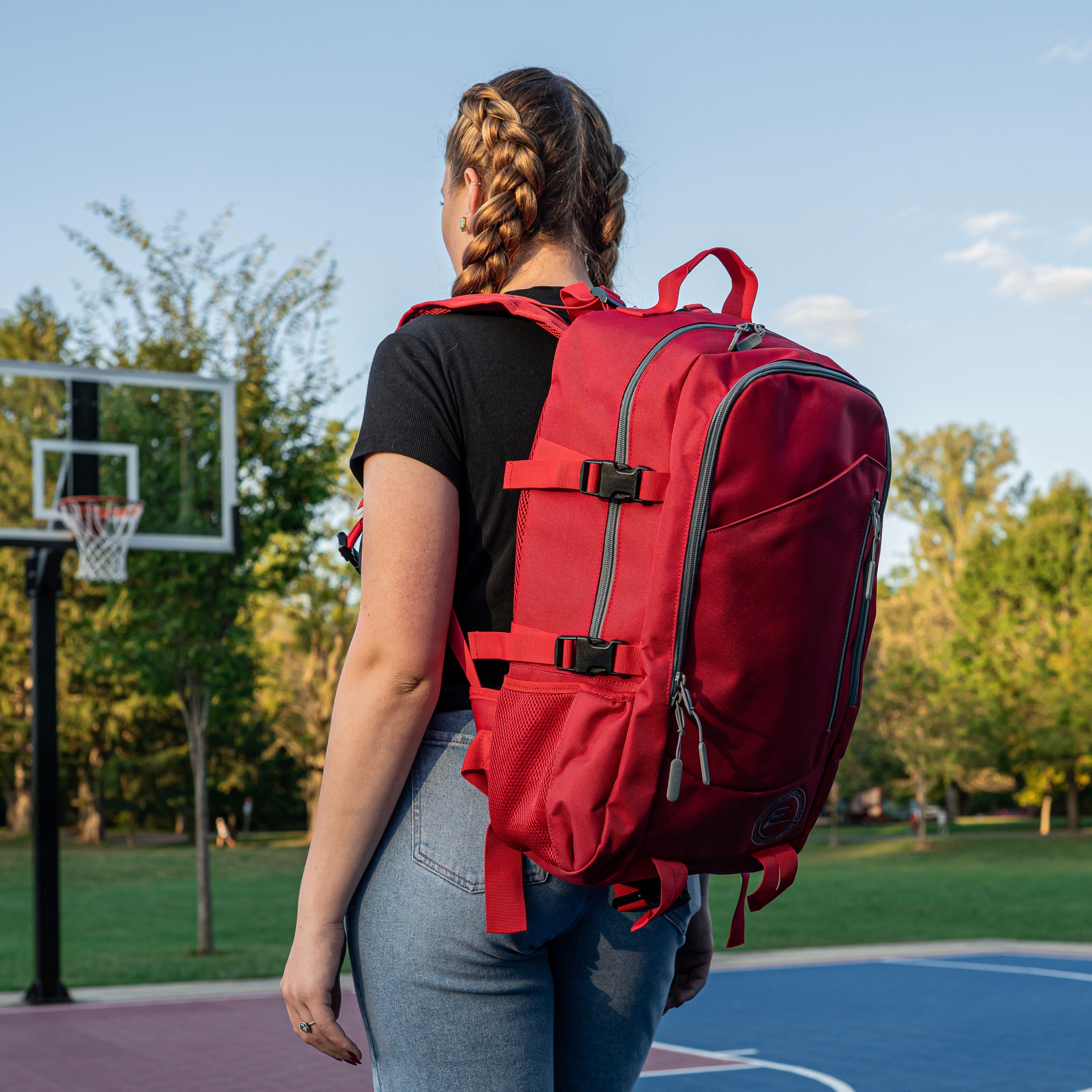 30L Red Backpack with Cup Holders made for sports.