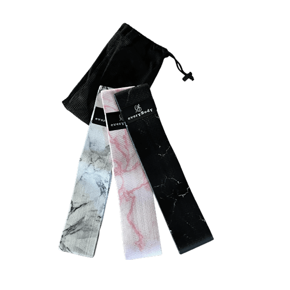 black, pink, and white marbled print glute resistance bands set with carrying bag