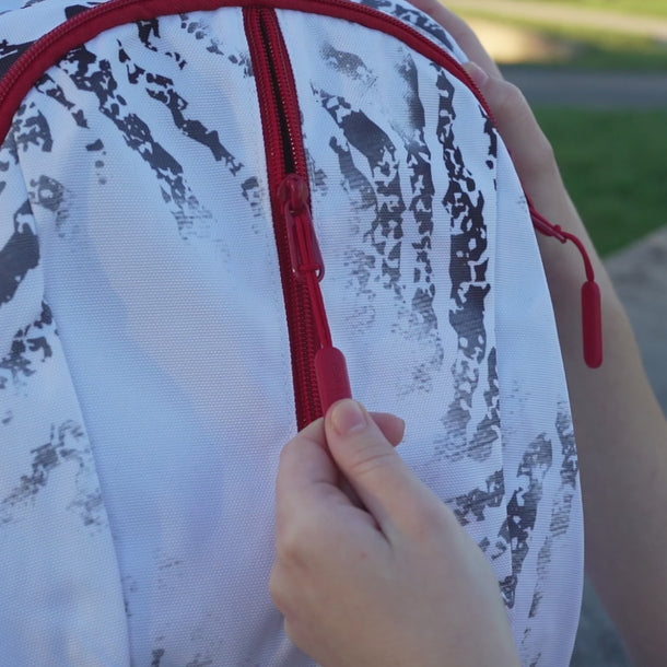 30L Zebra Backpack with Cup Holders being modeled outdoors by a young girl.