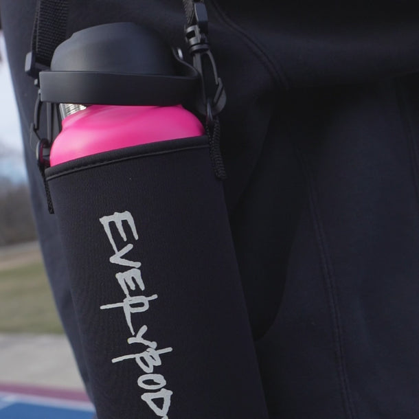Hot Pink Stainless Steel Water Bottle being used by a young girl, featuring a durable and practical design, making it great for any adventure.